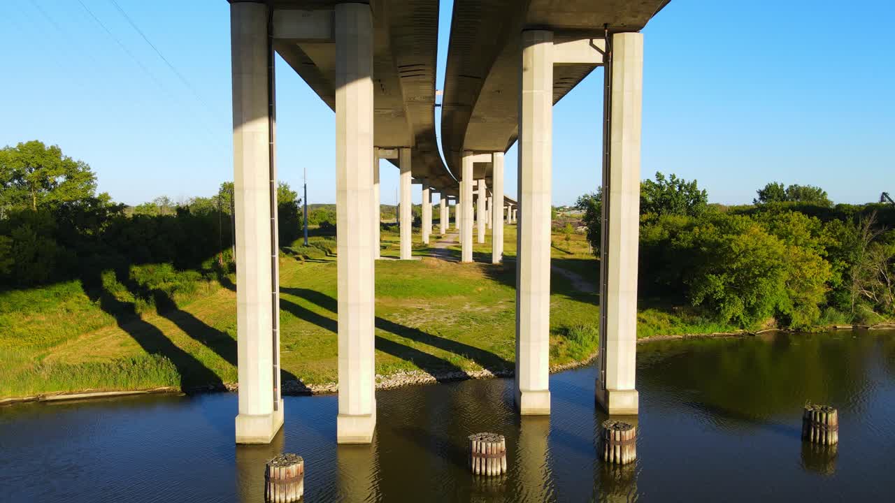 High beams of Zilwaukee Bridge over the Saginaw River, aerial view under brdige