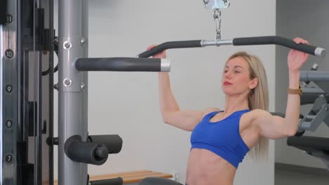 a young girl is training in the gym strength training a young girl is training in the gym strength training