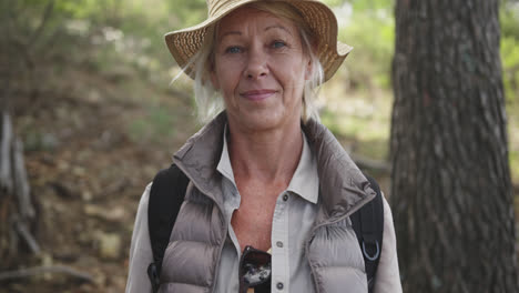 active senior woman in the forest