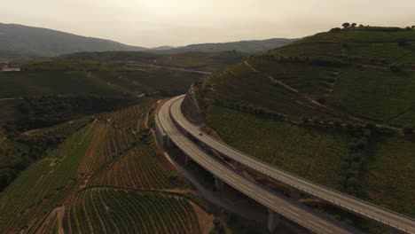 cars driving in highway on the famous moutains vineyards