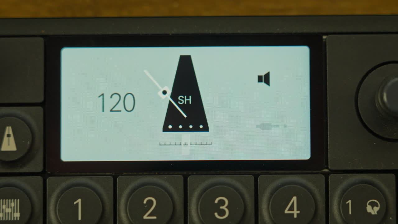 Close Up of Digital Metronome Screen Showing Tempo