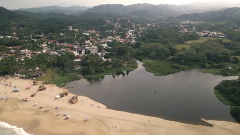 drone landscape of natural biosphere beach lagoon reserve san pancho mexican summer, nayarit