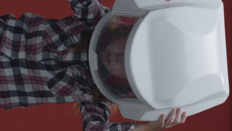 child in astronaut helmet
