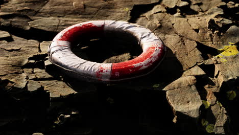 very old abandoned grungy lifebuoy