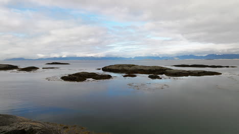 Net-Sculpture-Made-of-Recycled-Materials-On-The-Rocky-Coast-Near-Tranoy-Lighthouse-In-Hamaroy,-Nordland,-Norway