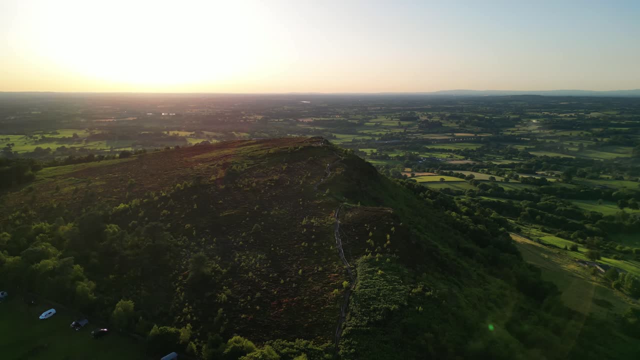 The stunning spiritual Cloud at Bosley on a full moon weekend at sunset , Staffordshire UK - drone clockwise rotate