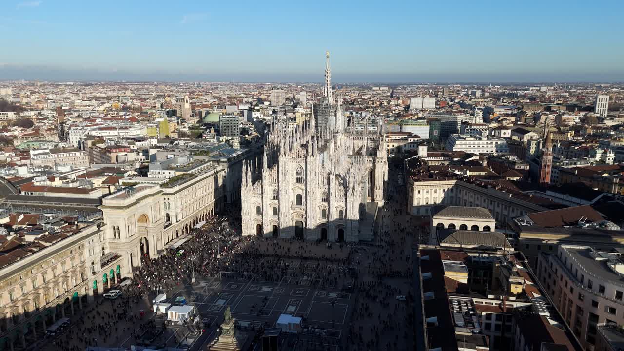 duomo Milan Italy cathedral old town downtown aerial wide angle front view during summer sunny day with crowd of tourist on the main square