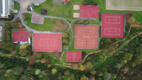 aerial top down view of empty red sports courts