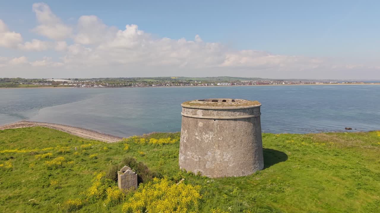 Napoleonic Era Tower Fort on Grassy Headland Overlooking the Sea Coastal Ireland