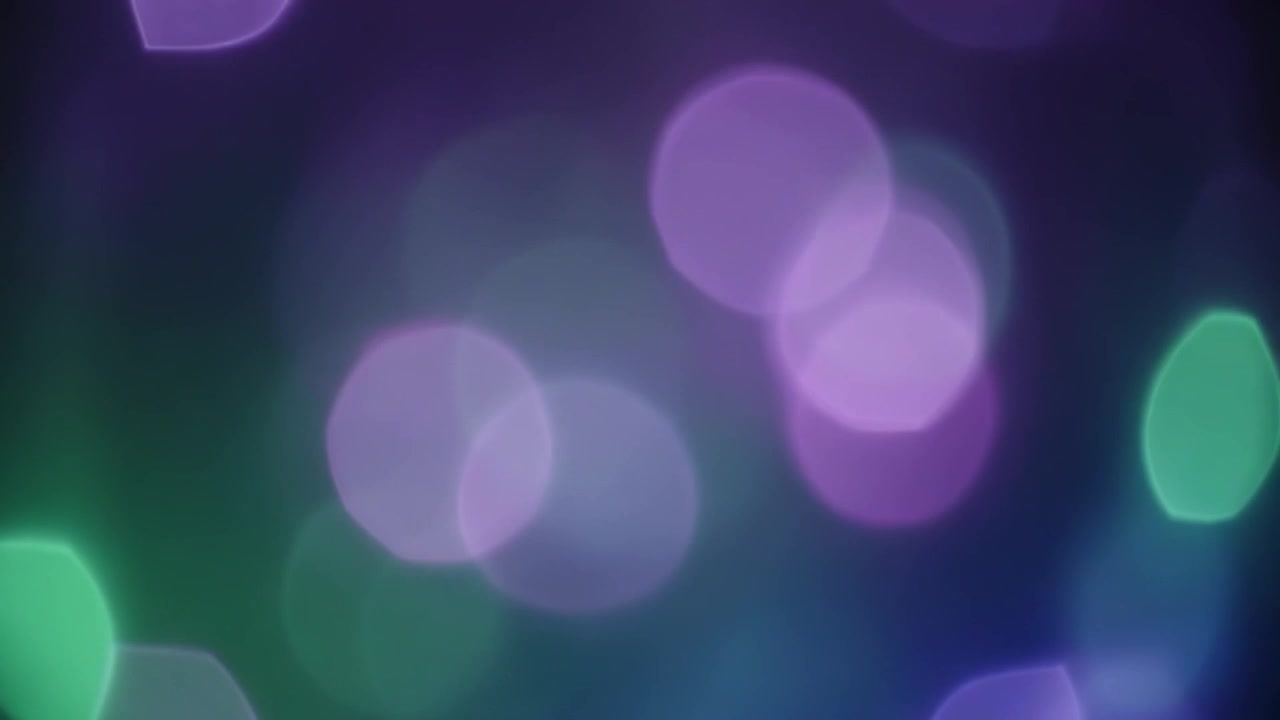 Abstract Background with Soft Purple and Green Bokeh Light Orbs