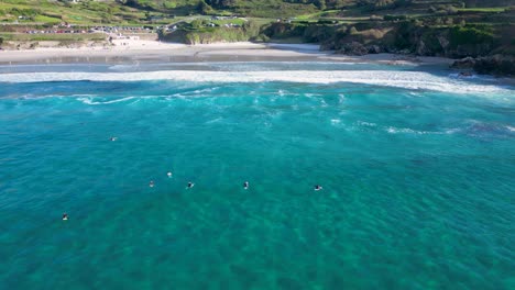 Surfing-At-Praia-de-Caión-During-Summer-In-Galicia,-Spain