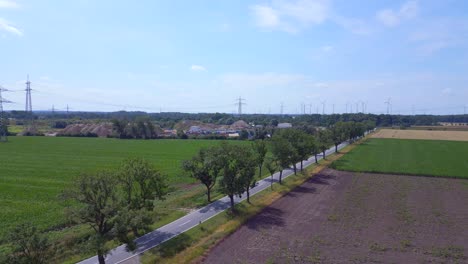 Ciclista-En-El-Callejón-De-La-Carretera-Rural