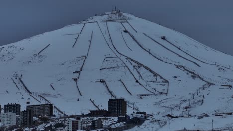 aerial establishing shot of the multiple ski slopes at the el colorado resort