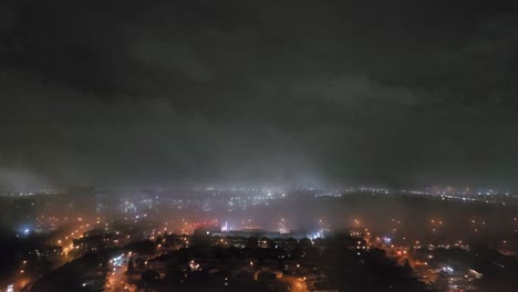 toronto city lights in dense fog at night, moody and mysterious urban scene