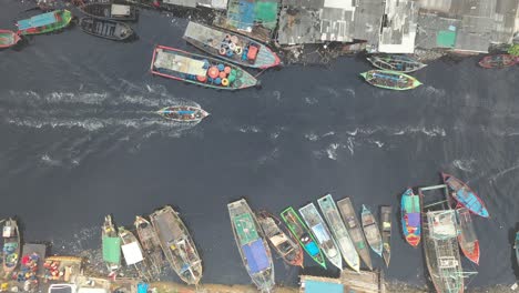 aerial view of a canal city with boats