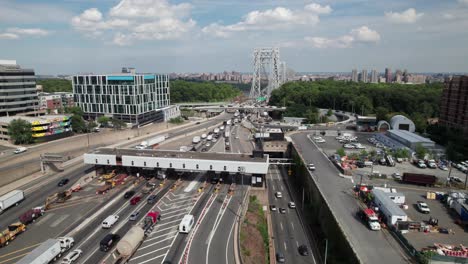 Toll-plaza-traffic-at-New-York-City-bridge,-4K-aerial