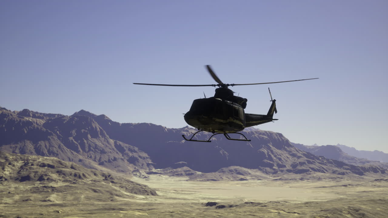 Helicopter flying over a vast desert landscape near mountain ranges