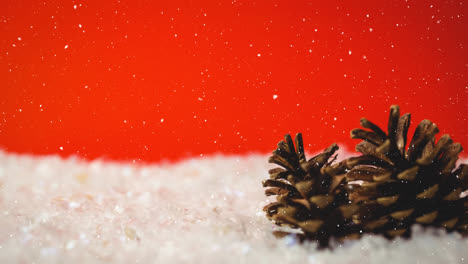 animation of snow falling over christmas decorations