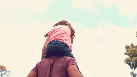 Father-and-daughter-having-fun-in-the-park