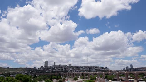 timelapse video of queretaro city viewed from the "mirador de los arcos