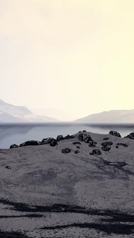 peaceful landscape with a mountain range in the distance