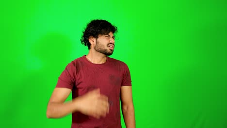 Indian-man-shy-with-green-background-Indian-green-screen