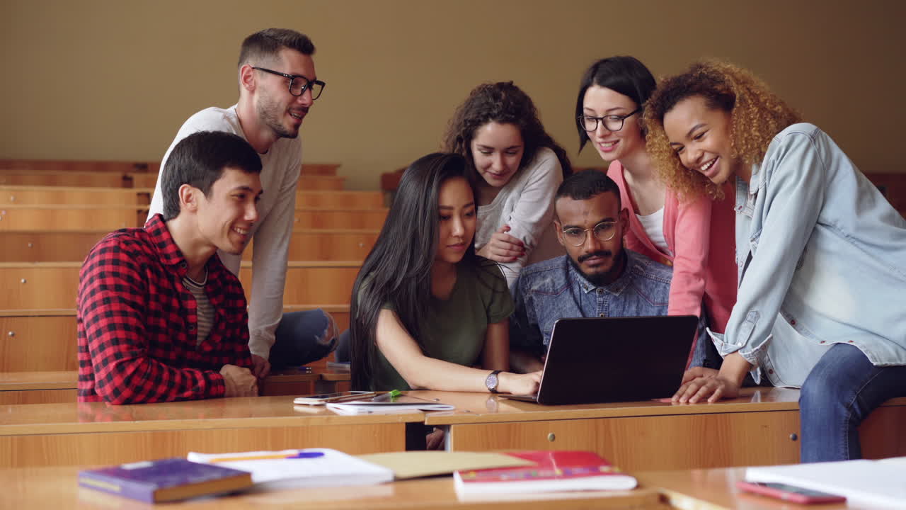Students Collaborating on a Laptop in a Classroom