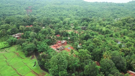 small village in hill station in rainy season drone view