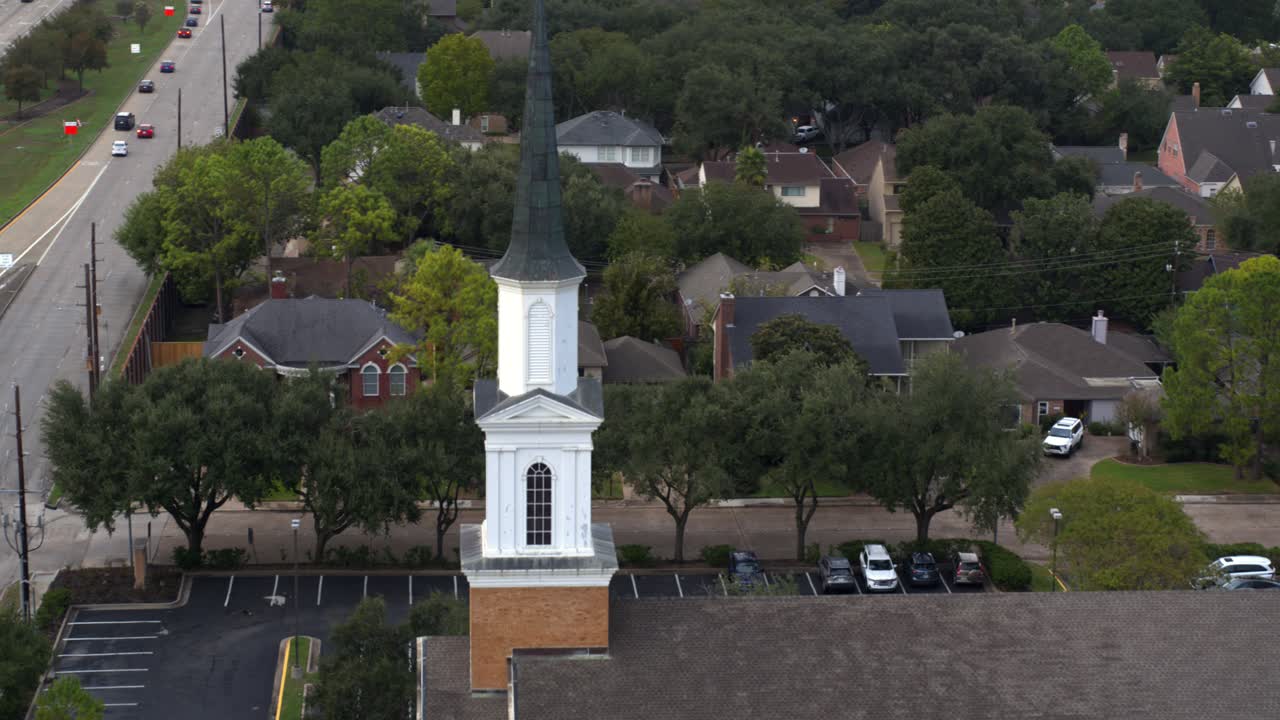 Drone view of a church surrounding by homes in Southwest Houston, Texas