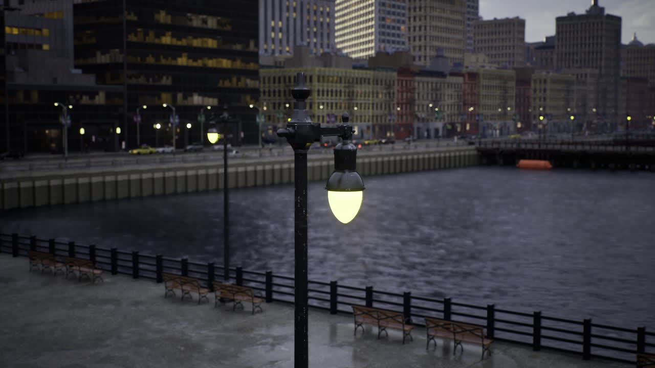 Calm waterfront with lampposts illuminating the serene cityscape at dusk