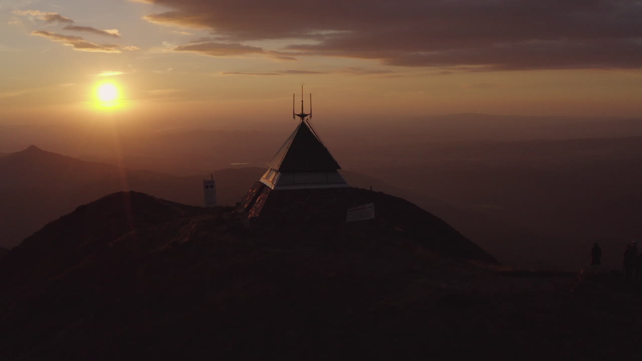 Sunset aerial shot of fire lookout in victoria mt buller, drone.