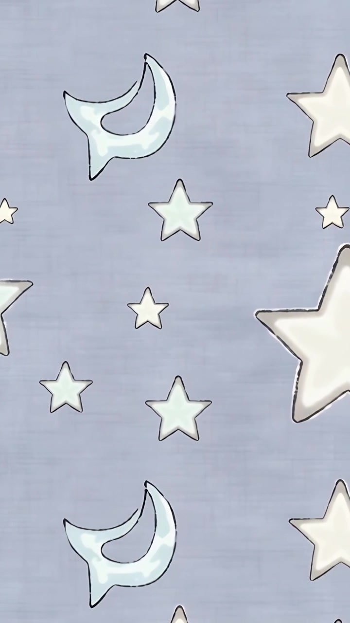 Vertical video: Panning across pale-blue textile, five-point stars and crescents revealing pattern