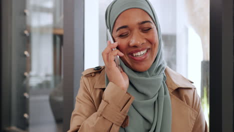 Muslim-business-woman,-laughing-and-phone-call
