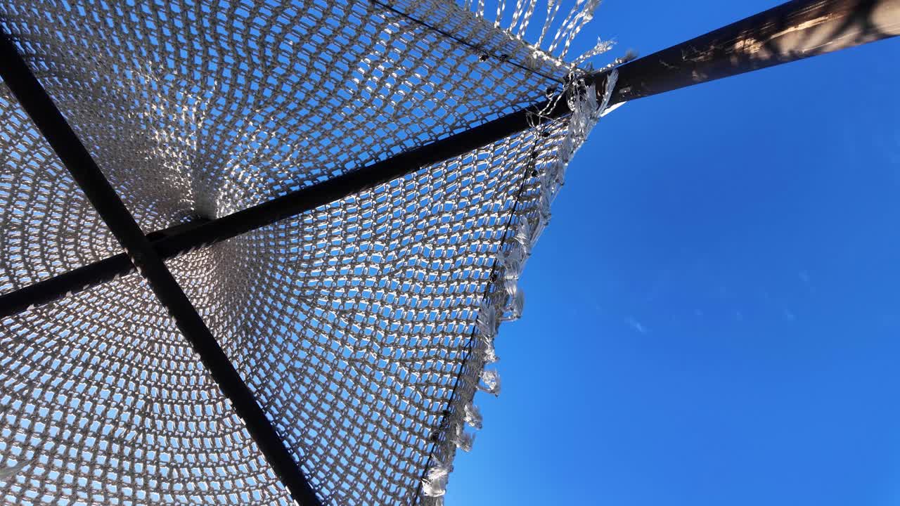 Sunbed umbrella luxury beach resort Ksamil Albania, clear blue sky summer season relaxation