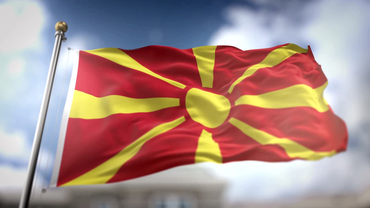 Republiken Makedoniens flagga vajar i slow motion 3D-rendering blå himmelsbakgrund - Sömlös loop 4K