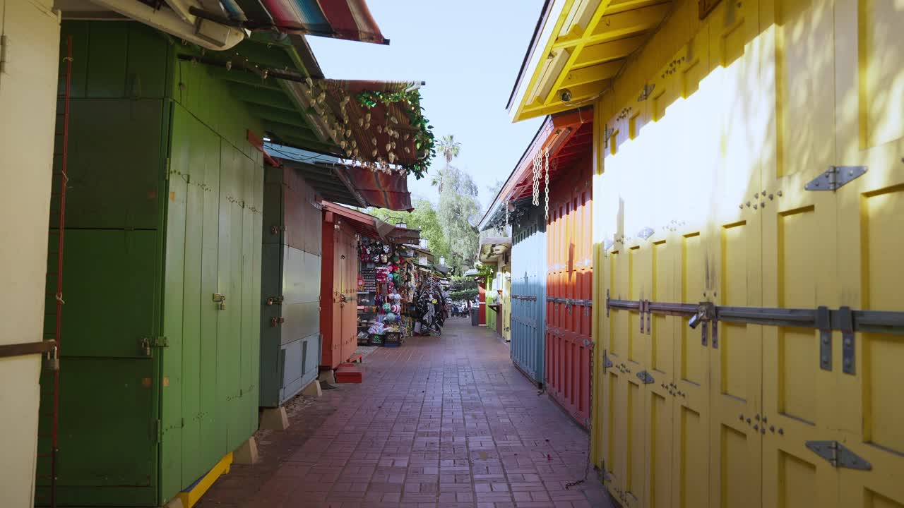 Alley with colorful business structures