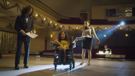 rehearsal of a play with a wheelchair-bound actress