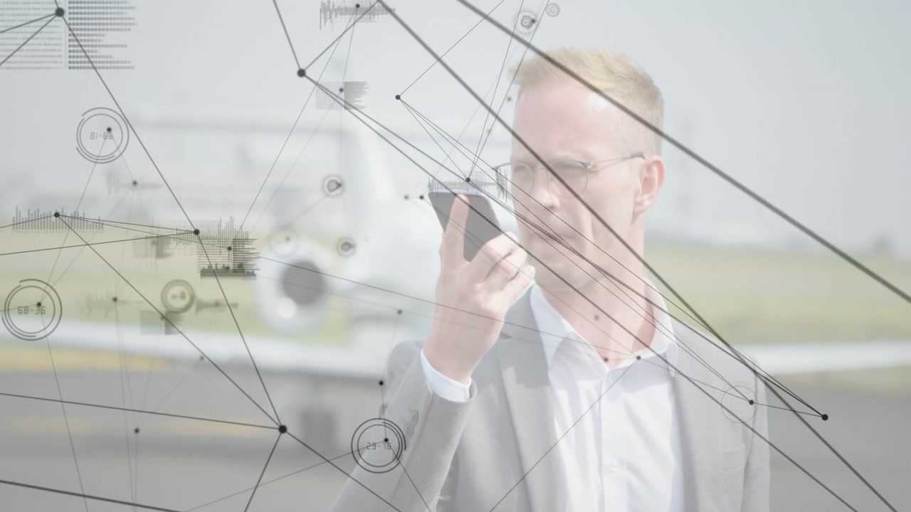 Man in suit raising smartphone on ramp, accessing business data while HUDs converging onto phone