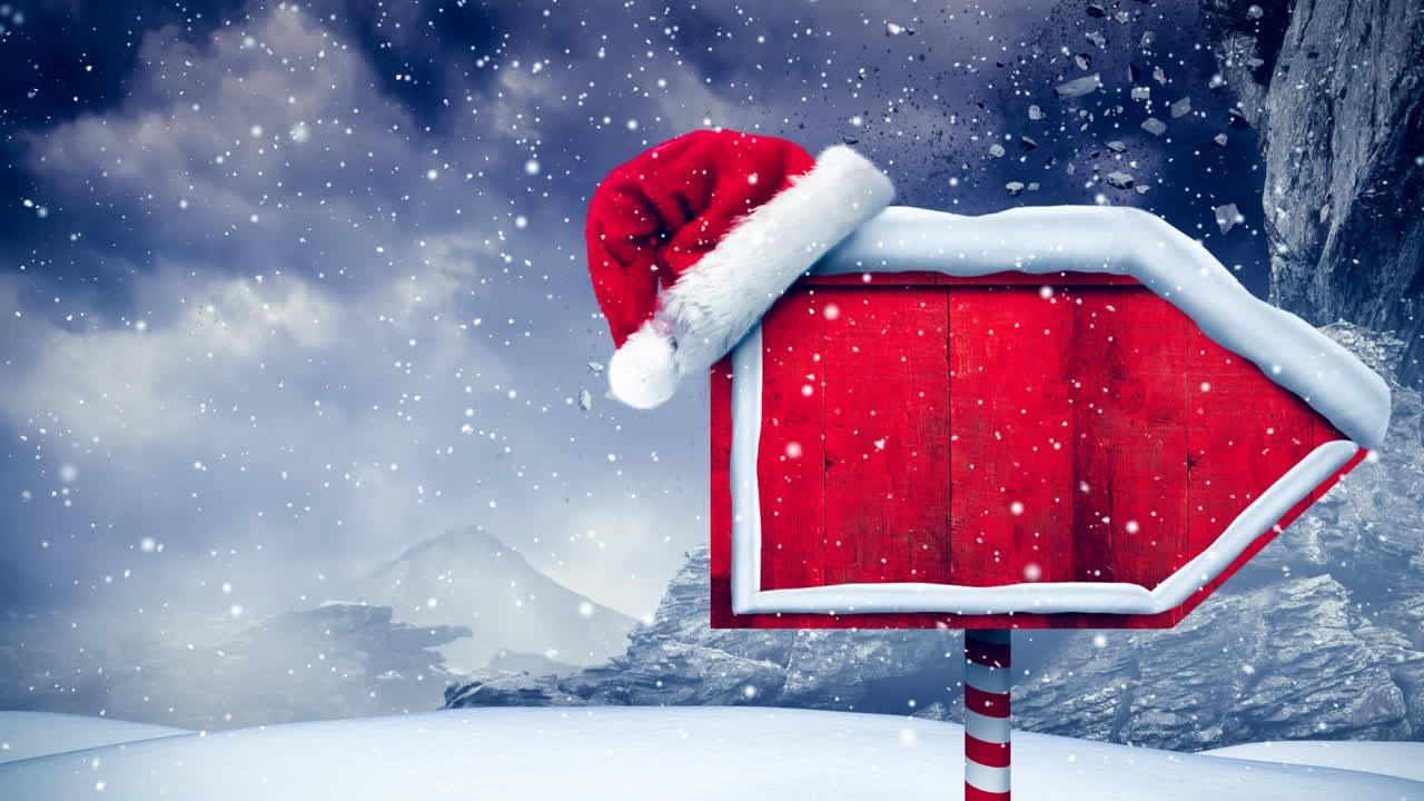 겨울 풍경에  ⁇ 은 나무 표지판 위에 눈이 내리고 산타 모자