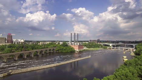 aerial of the stone arch bridge and mississippi river