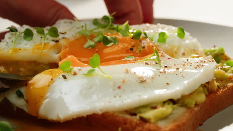 breakfast avocado toast with fried eggs