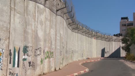 graffiti is drawn on the new west bank barrier between israel and the palestinian territories