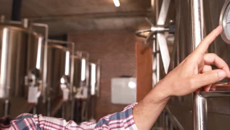 Brewery-worker-smiling-at-camera