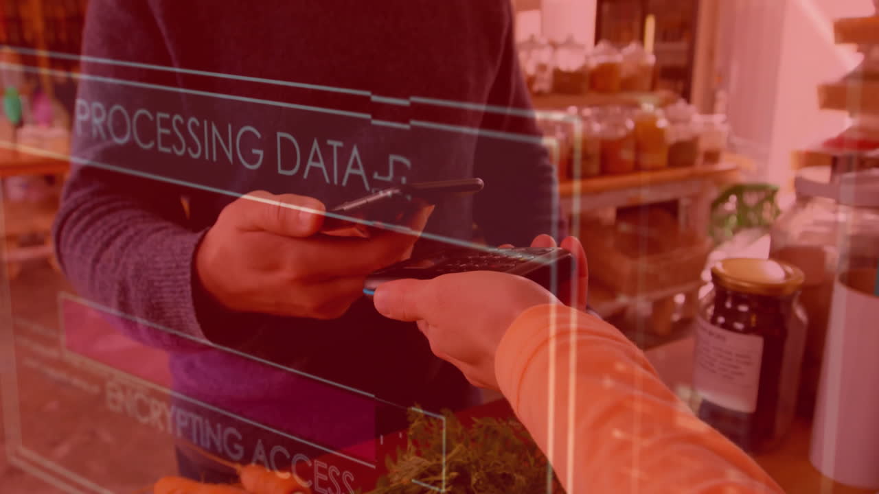 스마트폰으로 지불하는 두 인종 남성에 대한 데이터 처리의 애니메이션