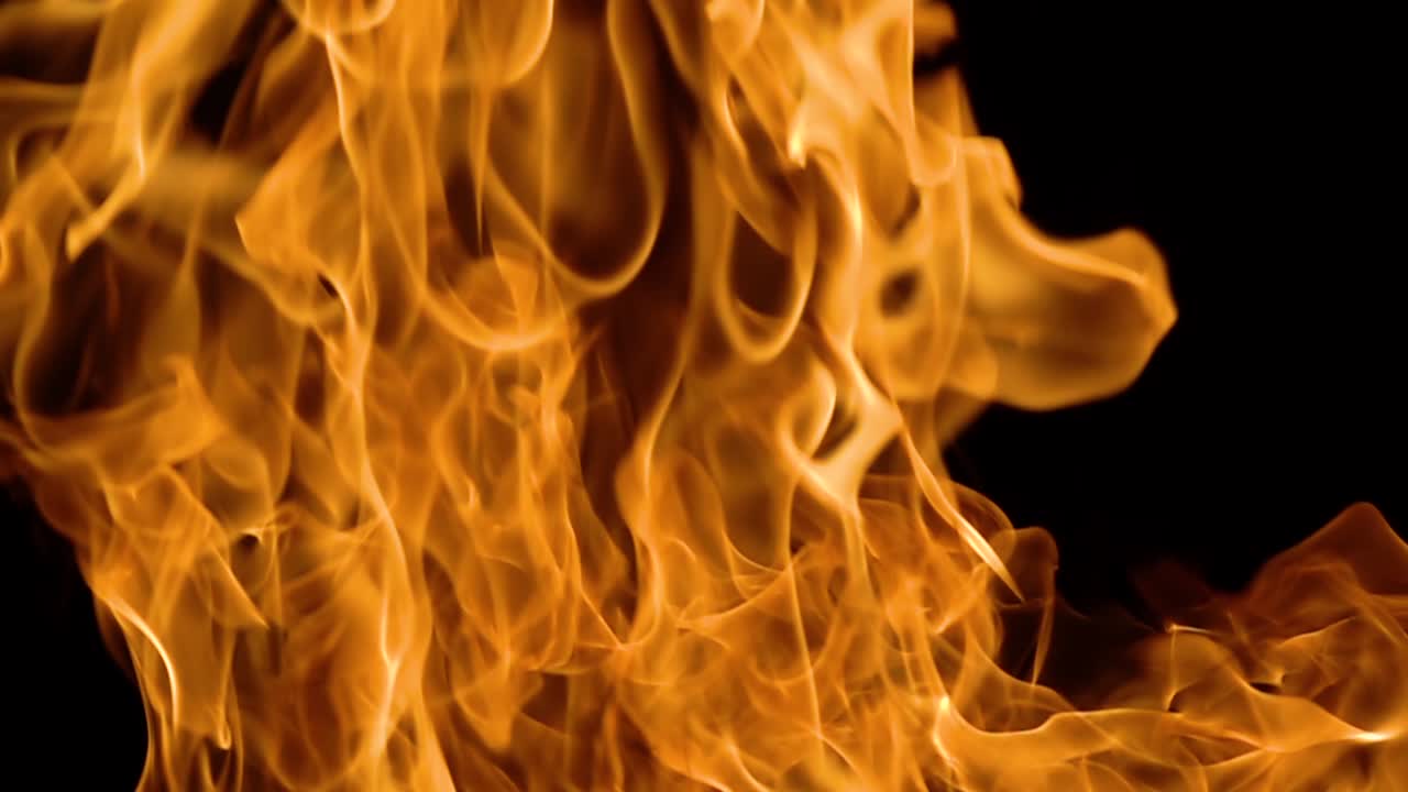 Flames of fire on black background in slow motion