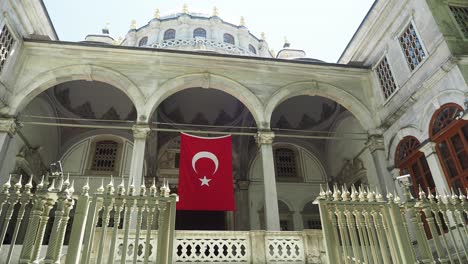 turkish historical building with flag