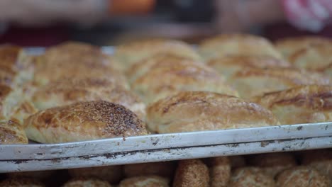 close-up of golden baked pastries on a tray