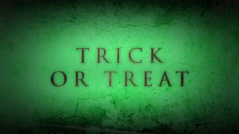 trick or treat on dark green grunge wall 1