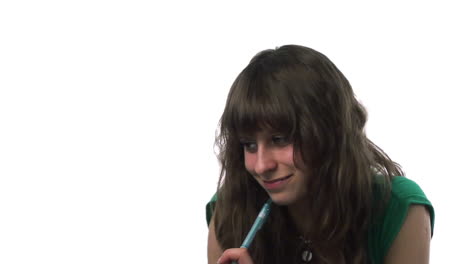 Teenager-studying-at-her-desk