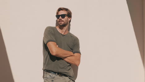 stylish man posing outdoors